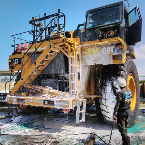 Cleaning Yellow Machinery for Export