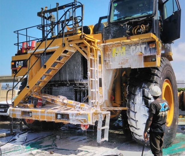 Cleaning Yellow Machinery for Export