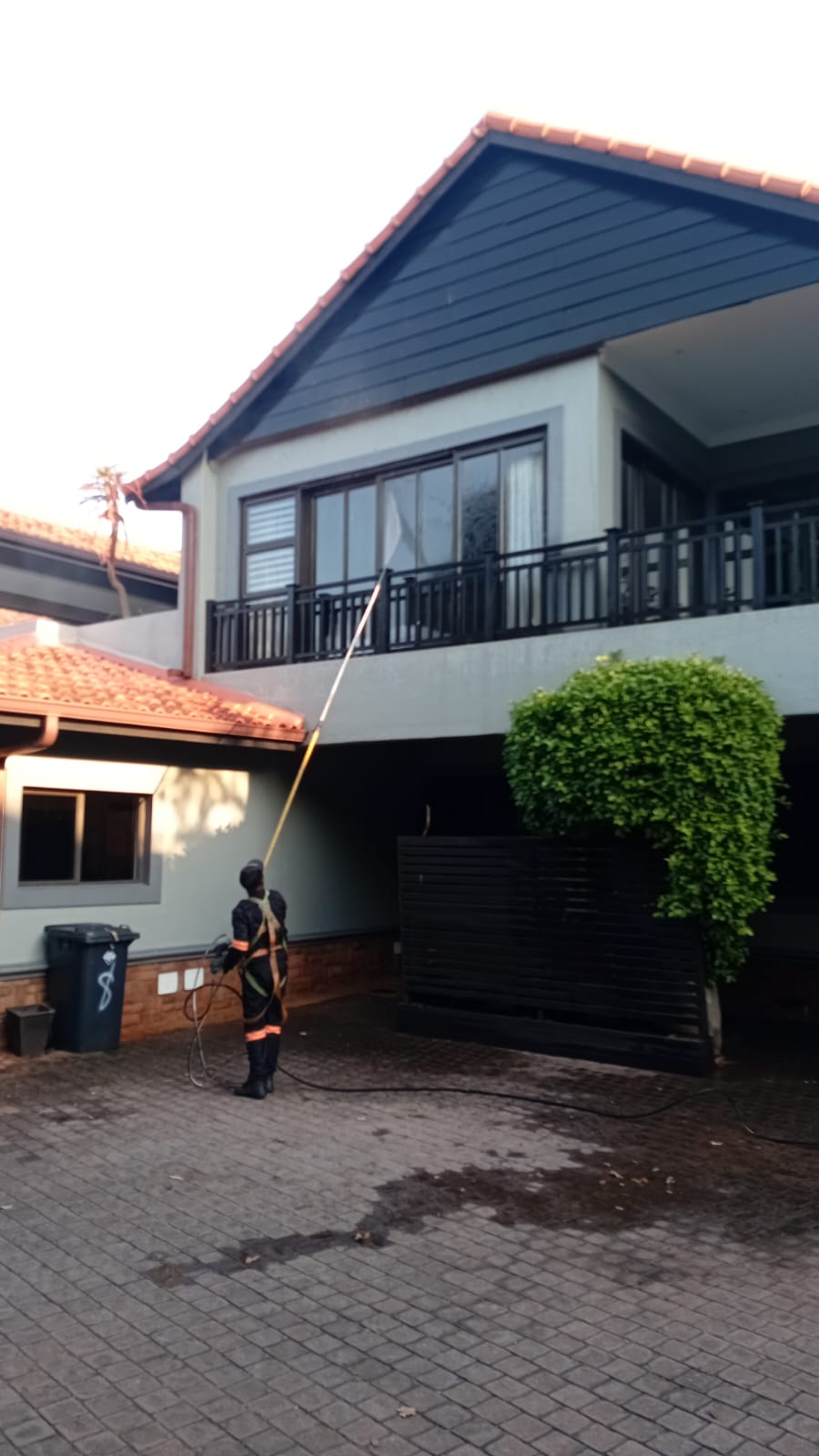 Residential window cleaning with water-fed pole