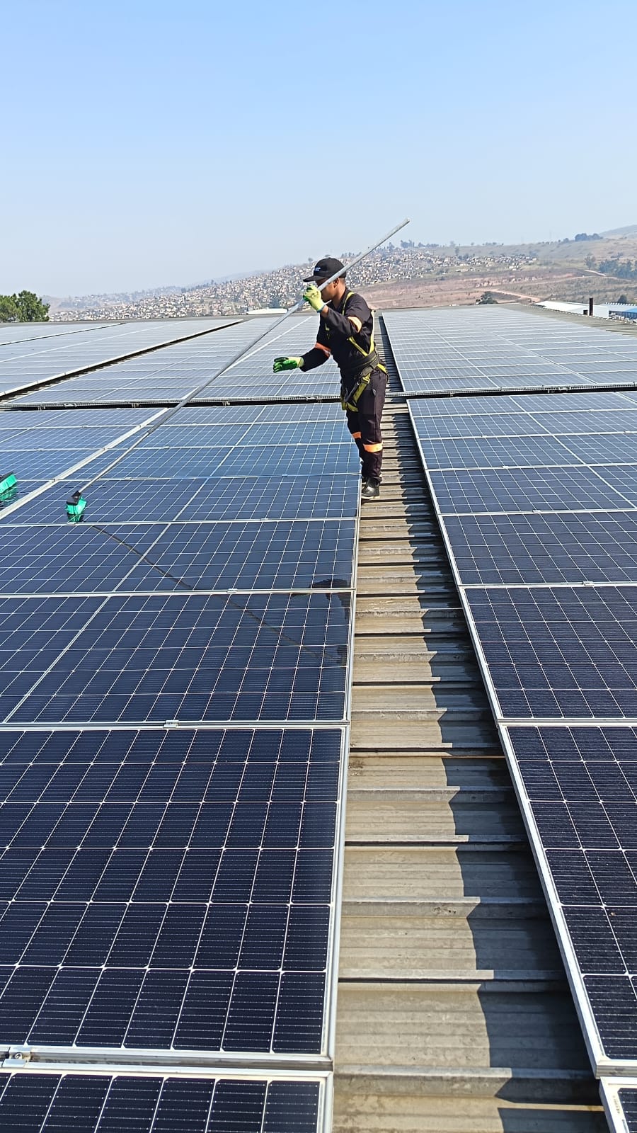 Solar panels cleaned on a commercial roof